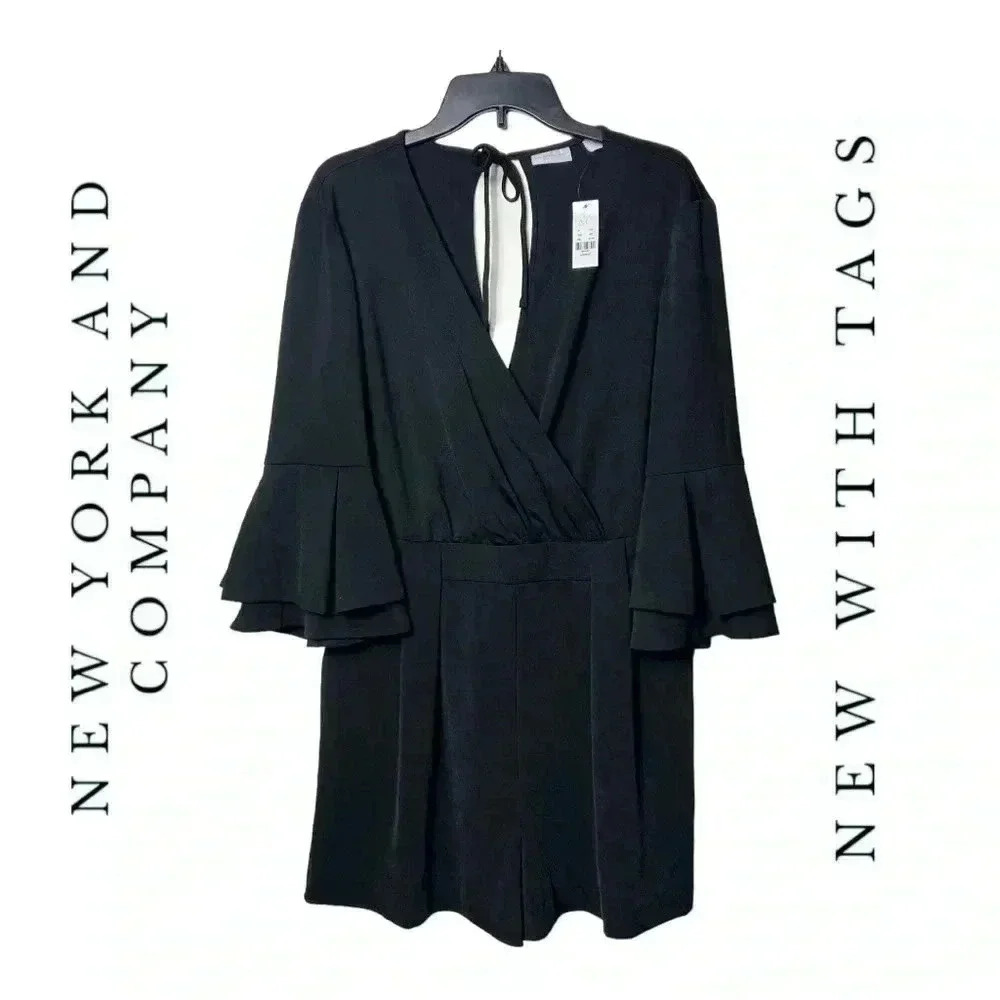 1596. NEW YORK AND COMPANY 3/4 SLEEVE‎ ROMPER BLACK IN COLOR SIZE LARGE